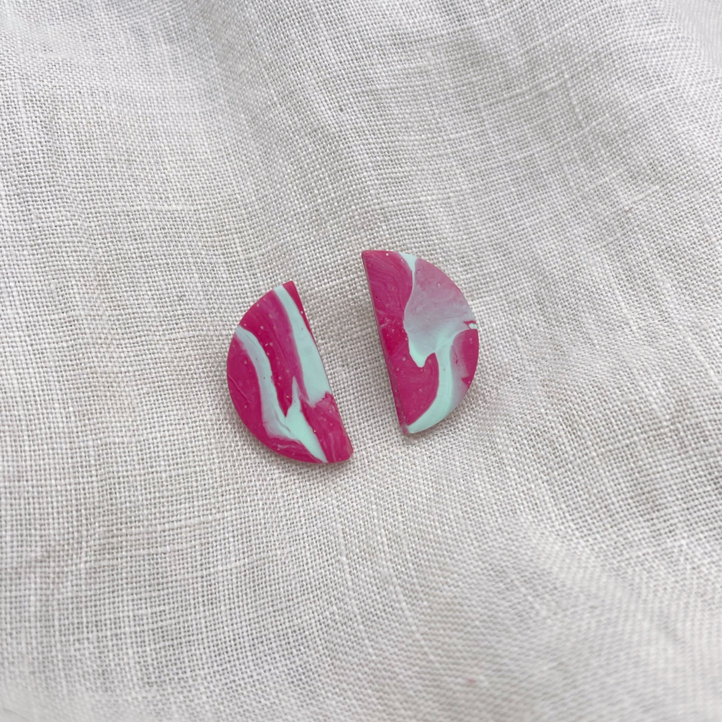 Half Pink Studs $18