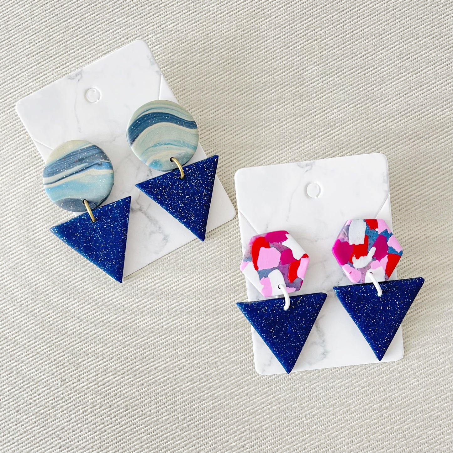 Navy Triangles Earrings $25